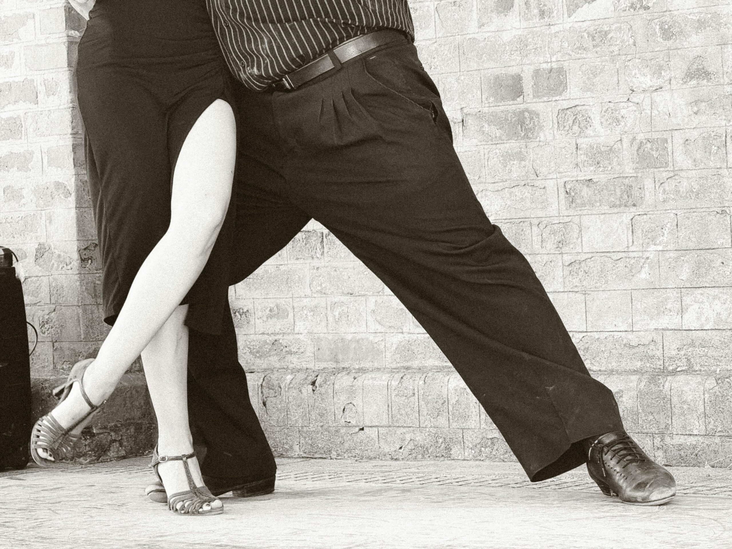 A couple performing an elegant tango dance in Buenos Aires, Argentina.